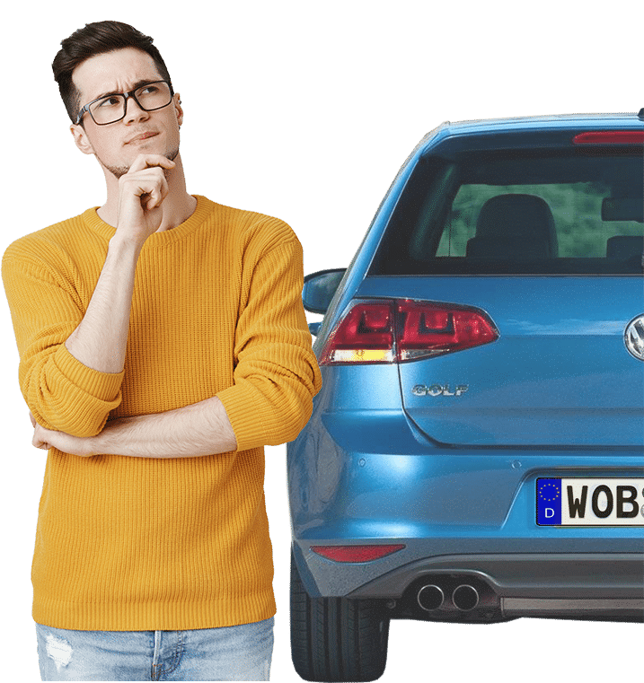 Mann mit seinem Dieselauto